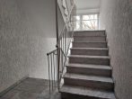 Treppenhaus - Gepflegte 3-Zimmer-Eigentumswohnung mit Balkon, Terrasse und Garage