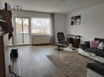 Wohnzimmer - Gepflegte 3-Zimmer-Eigentumswohnung mit Balkon, Terrasse und Garage